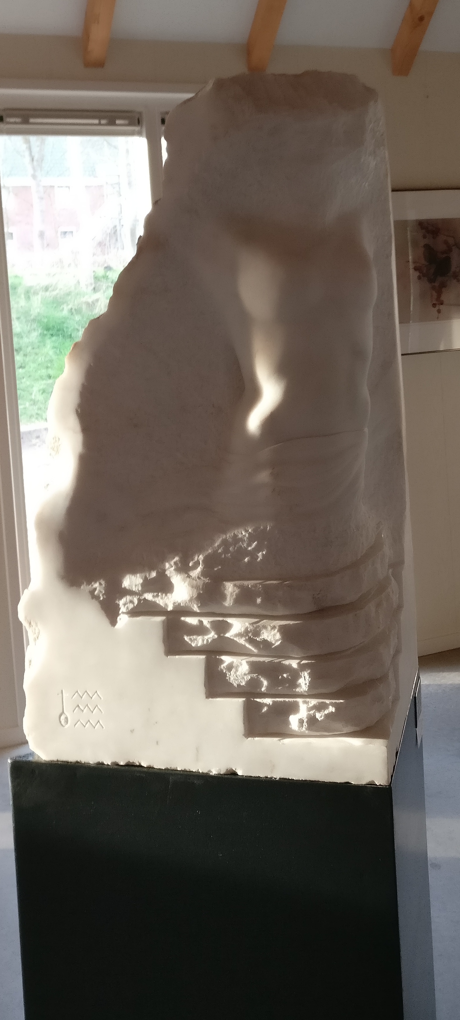 Amor Fugit marble sculpture by J van Bavel